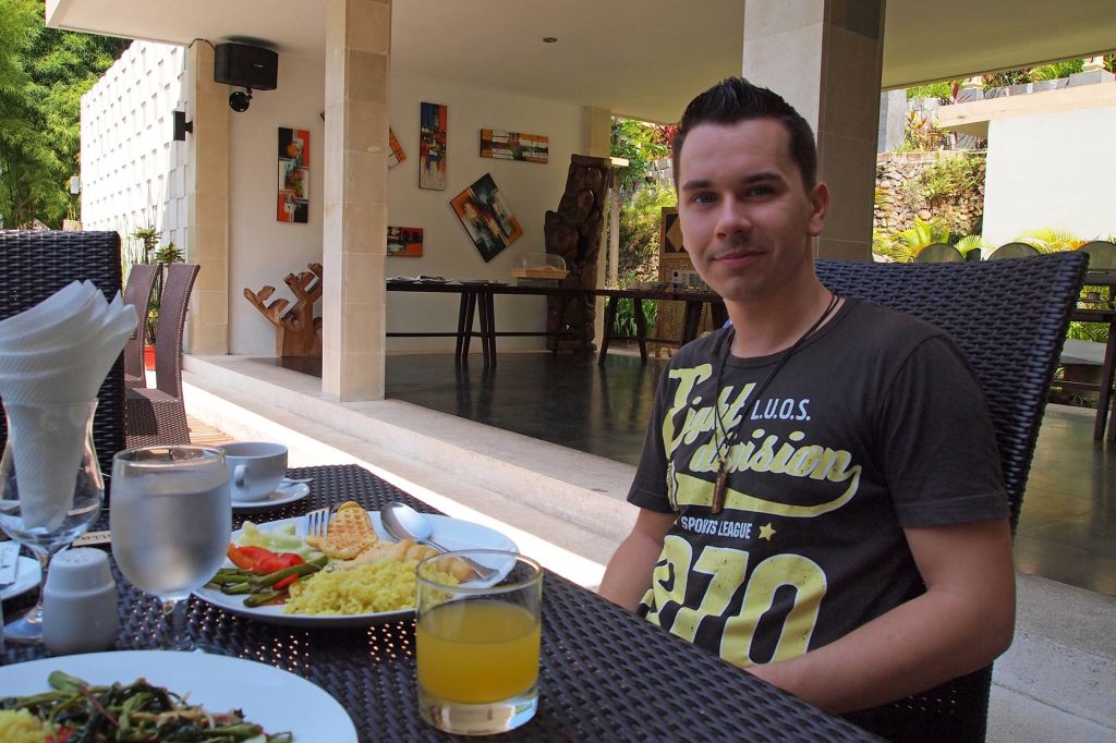 Marcel eating breakfast at Kebun Villas & Resort