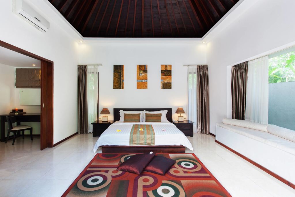 Schlafzimmer in der Angsana Villa im Kebun Villas & Resort
