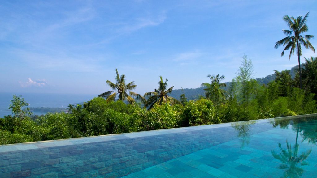 Outdoor area and the infinity pool of The Puncak