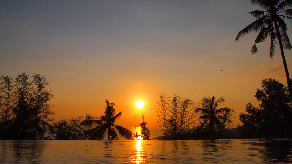 Sunset at the infinity pool of The Puncak