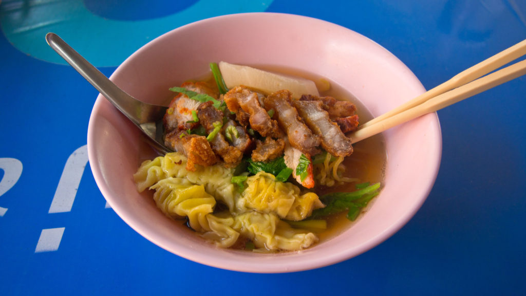 Bami Kiau Moo Grop - clear soup with yellow noodles, wonton and crispy pork