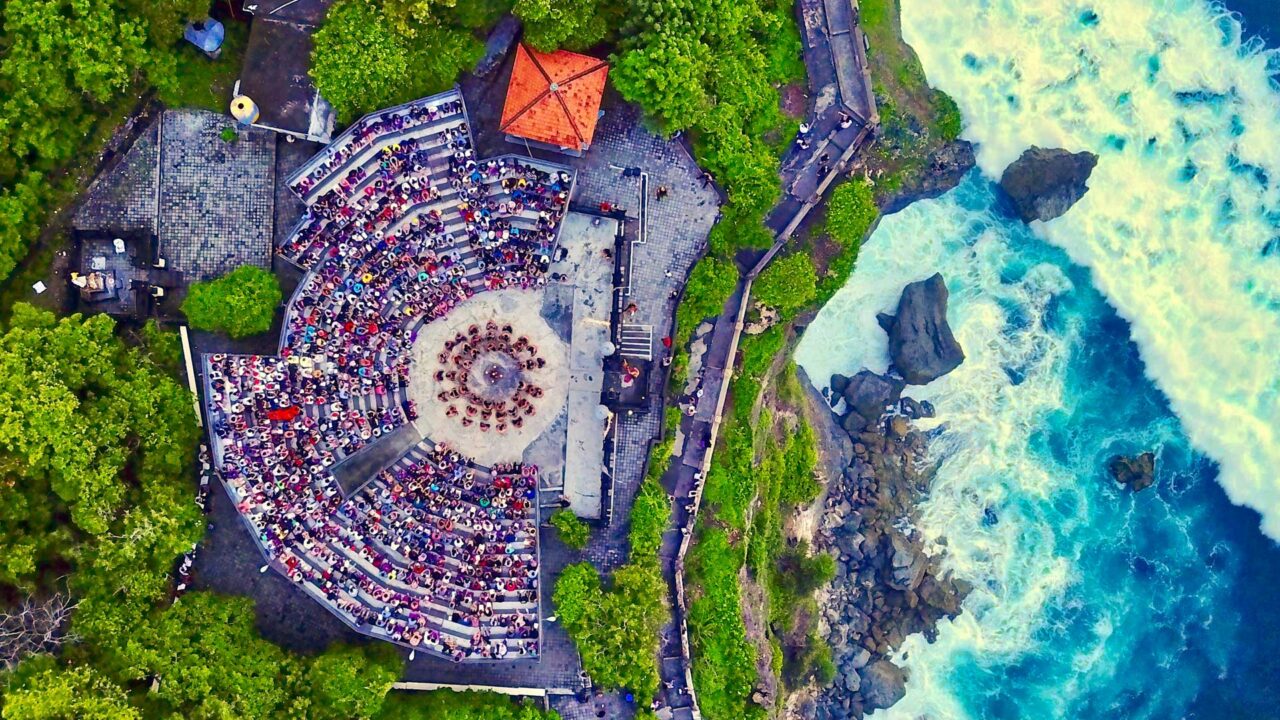 The Pura Luhur Uluwatu from above during the Kecak ceremony (drone shot)