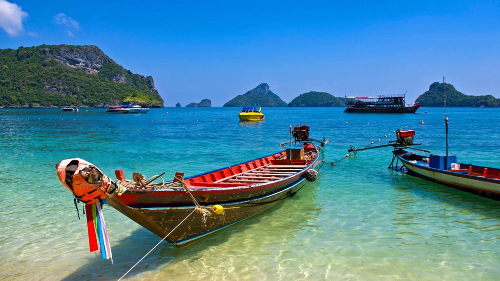 Longtail boats on the beach of Koh Mae Ko in the Ang Thong National Park