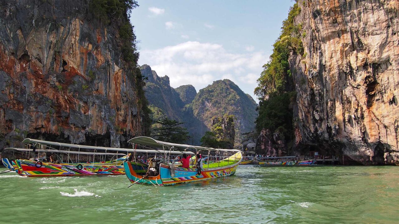 Boat in front of James Bond Island, Khao Phing Kan in Phang Nga