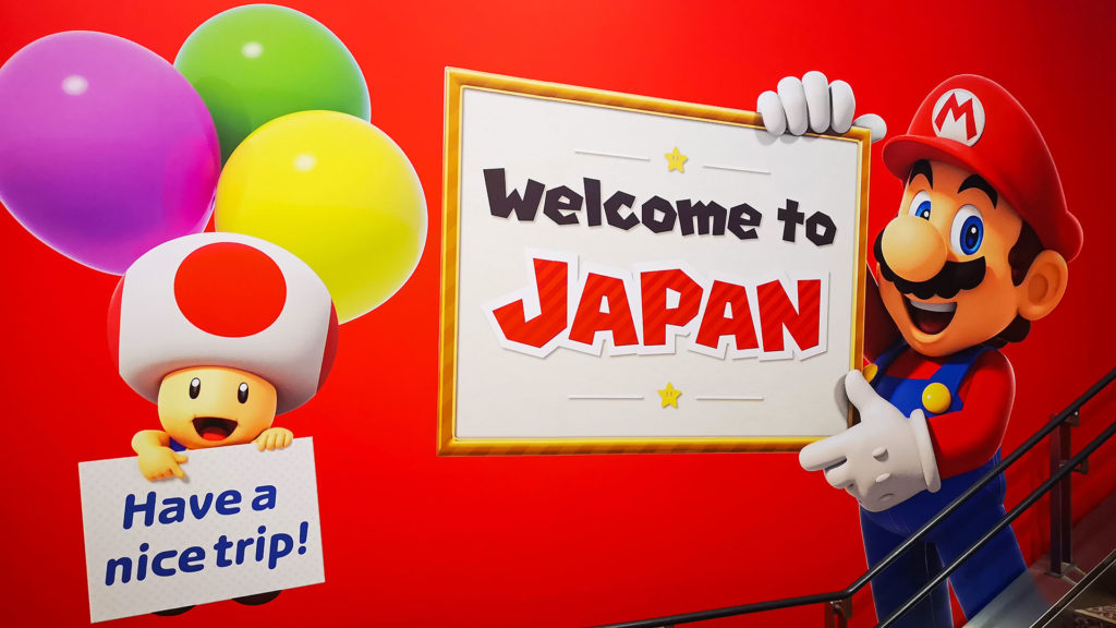 Mario begrüßt Gäste mit Welcome to Japan in Tokio
