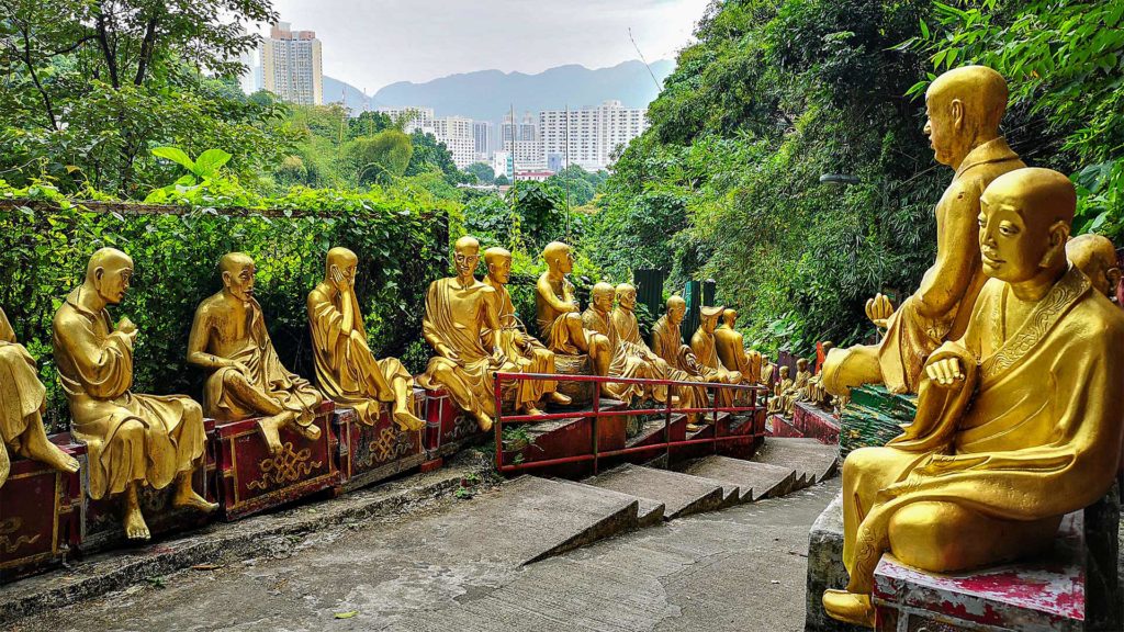 View of the Buddha statues and the Hong Kong skyline