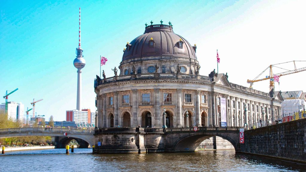 View from the Spree river to the Bode Museum on the Museum Island and the TV tower in the background, Berlin