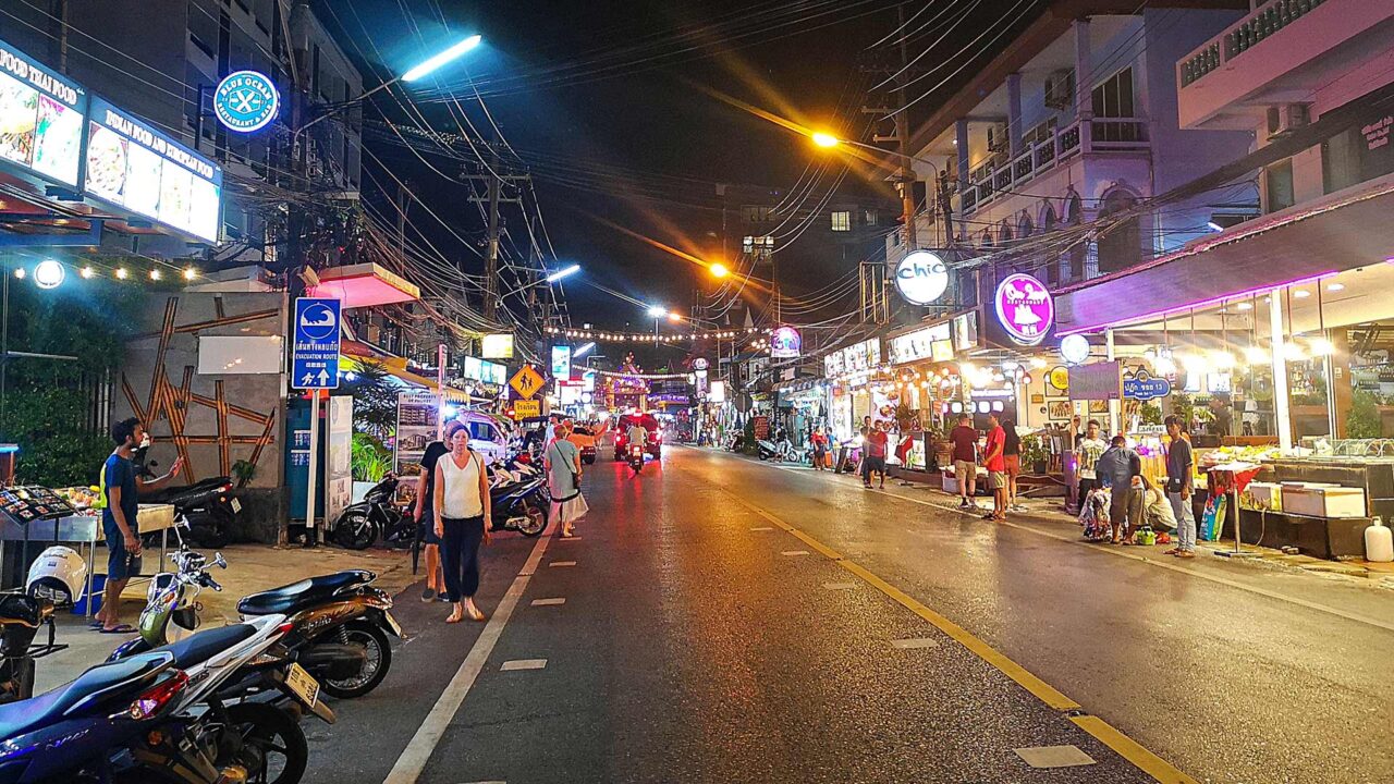Patak Road with many restaurants and bars in the evening in Karon, Phuket