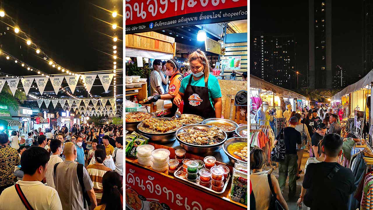 Besucher und Verkäufer auf dem Jodd Fairs Nachtmarkt in Bangkok